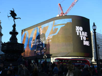 The trailer for the latest Bond film, No Time to Die, is aired for the first time on the large screen in London's Piccadilly Circus.