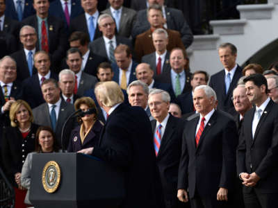 President Trump addresses Republican members of Congress as he speak about the passage of tax reform legislation on the South Lawn of the White House in Washington, D.C., December 20, 2017.