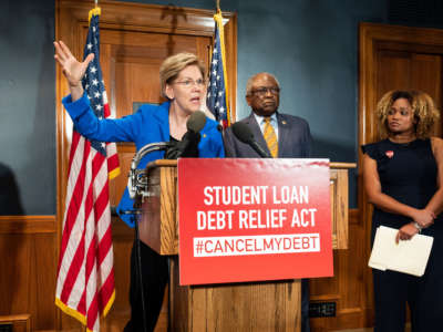 Sen. Elizabeth Warren announces a bill to cancel student loan debt on July 23, 2019. Warren recently updated her plan to clarify that she plans to use executive authority to cancel student debt, without needing to wait for Congress to act.