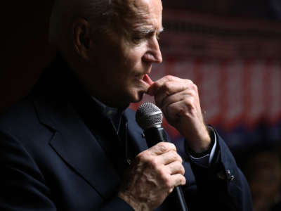 Joe Biden pulls on his bottom lip
