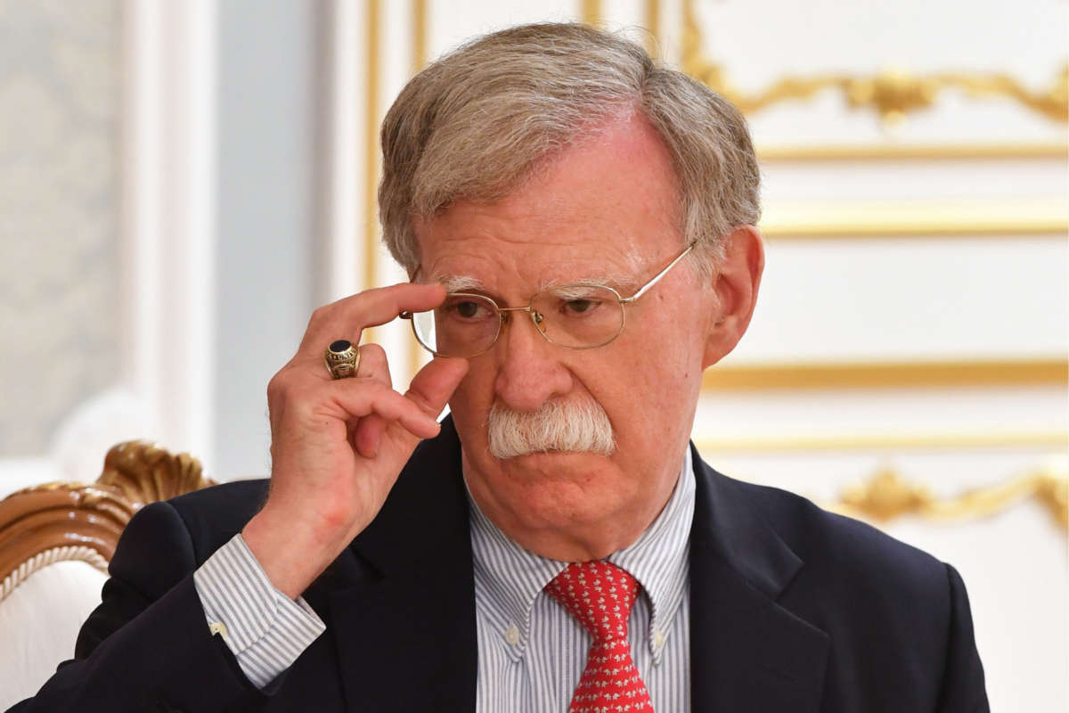 Then-U.S. National Security Advisor John Bolton during a meeting with Belarus' President Alexander Lukashenko, August 29, 2019.