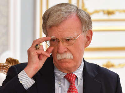 Then-U.S. National Security Advisor John Bolton during a meeting with Belarus' President Alexander Lukashenko, August 29, 2019.