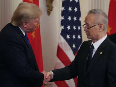 Donald Trump shakes hands with Chinese Vice Premier Liu He, before signing the phase 1 of a trade deal between U.S. and China, in the East Room at the White House, on January 15, 2020, in Washington, D.C.