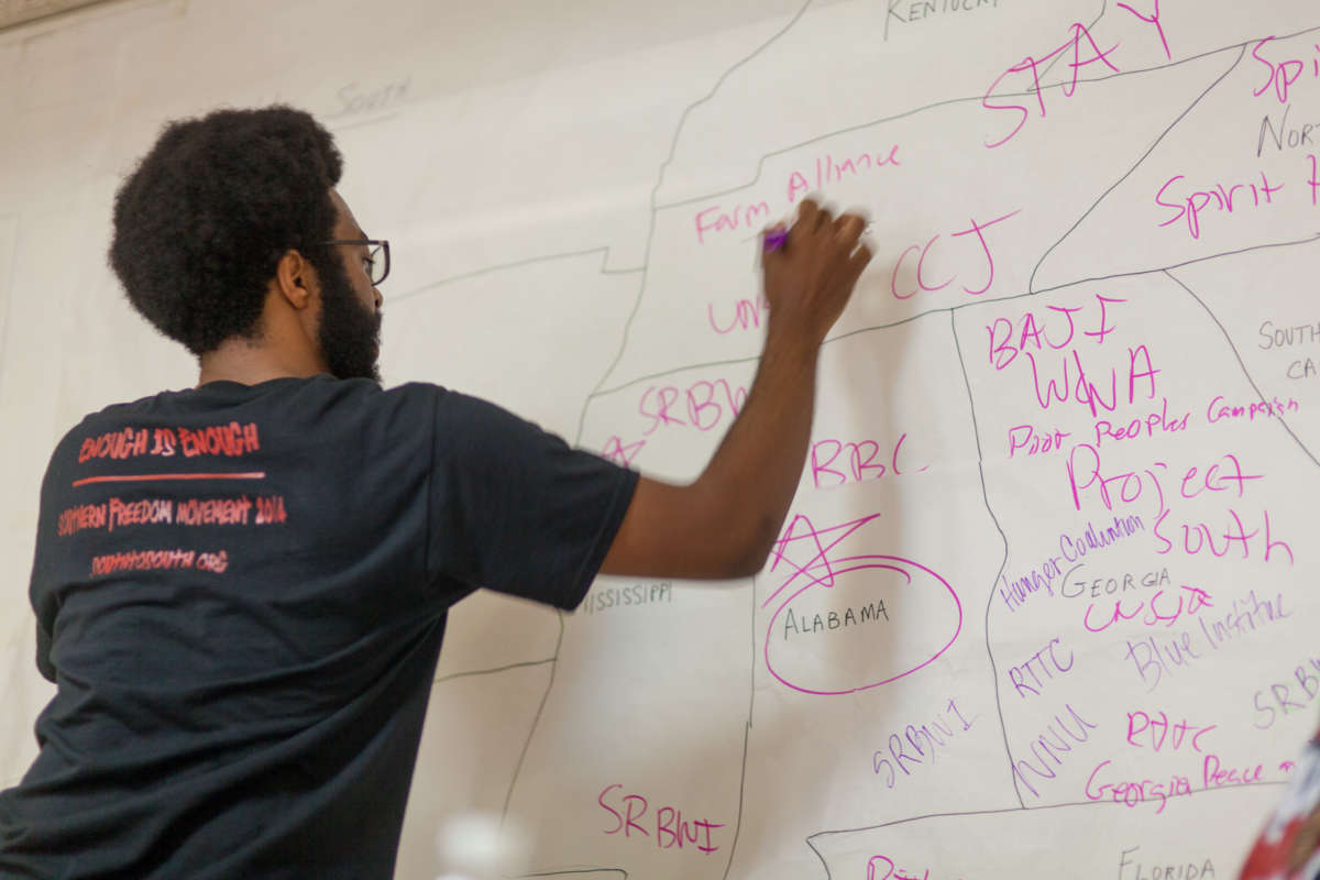 Project South former staff member Jovan Julien maps connections across the region at organizing training.