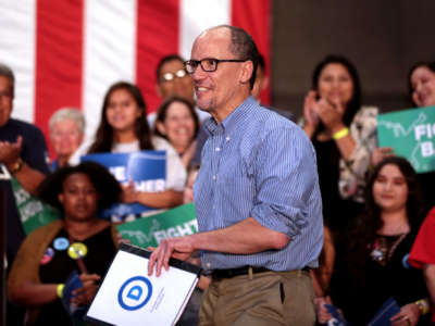 Democratic National Committee (DNC) Chairman Tom Perez speaks with supporters at a rally hosted by the DNC at the Mesa Amphitheater in Mesa, Arizona, on April 21, 2017.