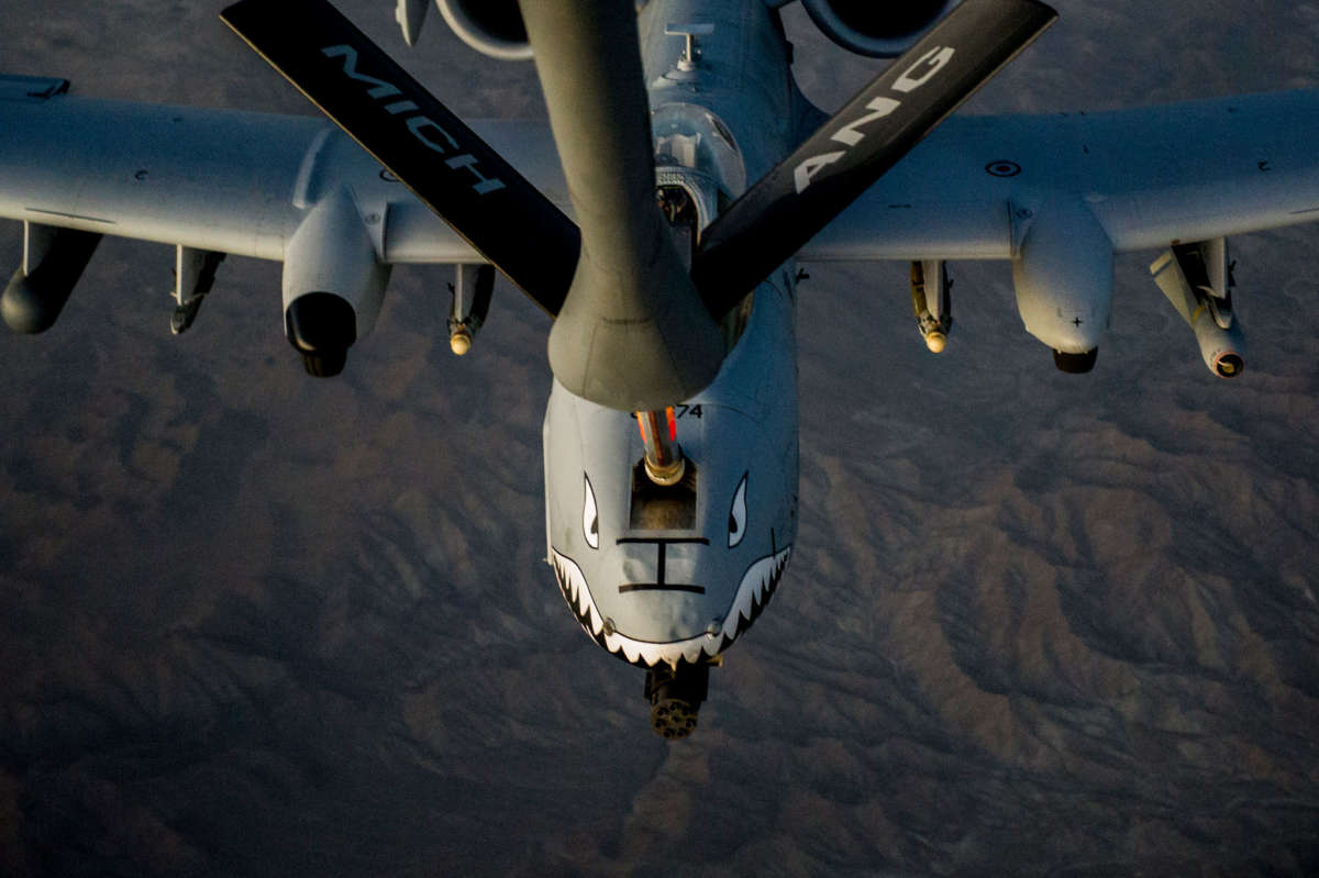 A U.S. Air Force A-10C Thunderbolt II aircraft receives fuel over Afghanistan, October 2, 2013.