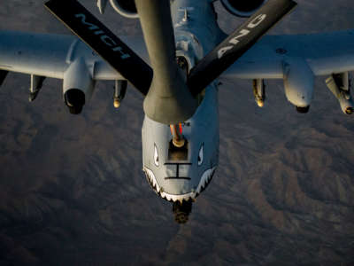 A U.S. Air Force A-10C Thunderbolt II aircraft receives fuel over Afghanistan, October 2, 2013.