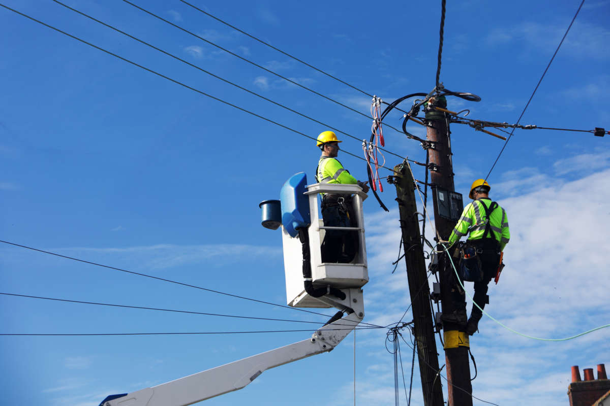 Cable workers work on cable