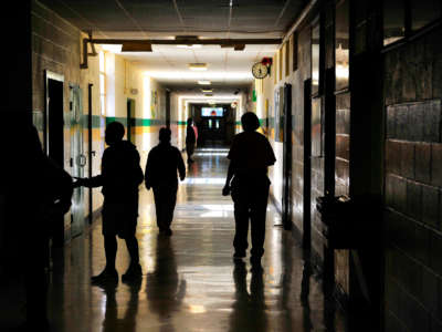 At Ruleville Central High School in Mississippi, pictured May 23, 2015, most of the clocks don't work and some of the lights in the hallways are out.