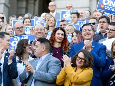 Colorado legislator Brianna Titone, at center in purple shirt, is a transgender woman who defeated her Republican opponent in a conservative district during the 2018 general election, to become Colorado’s first out transgender state lawmaker -- one of only four in the country.