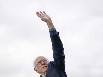 Bernie Sanders waves