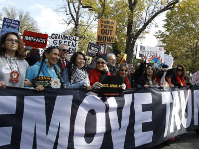 Activists take part in the "Fire Drill Friday" climate change protest on November 8, 2019, in Washington, D.C.