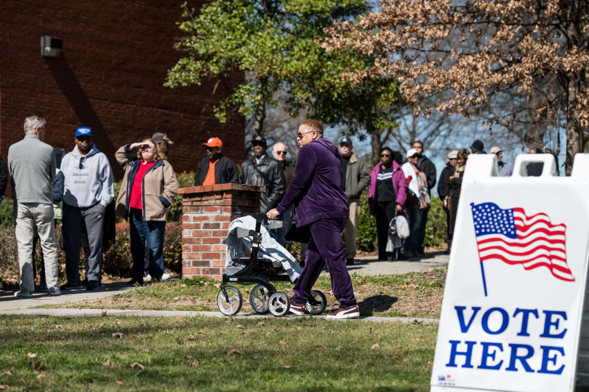 South Carolinians stand in line for early voting at the Richland County Election Commission February 27, 2020, in Columbia, South Carolina.