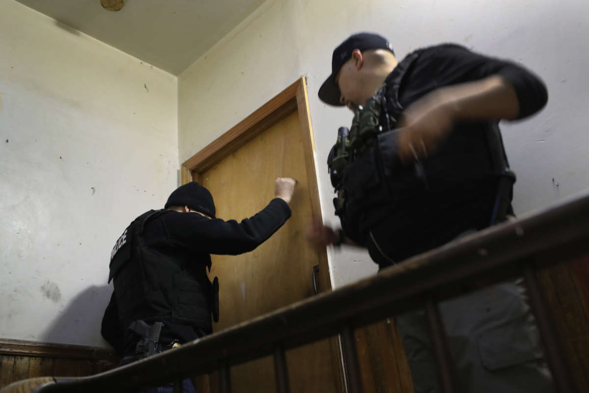 U.S. Immigration and Customs Enforcement (ICE), officers stage a raid to arrest an undocumented immigrant in the Bushwick neighborhood of Brooklyn on April 11, 2018, in New York City.