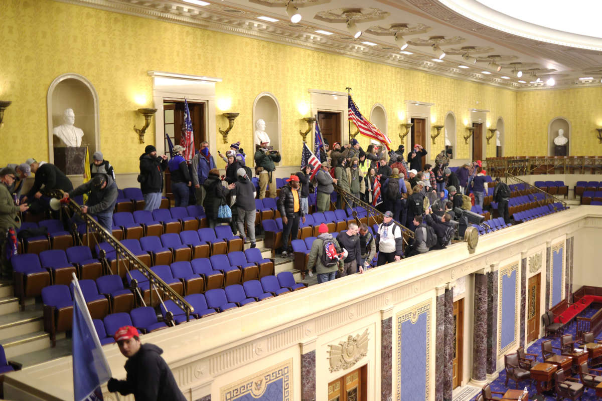 Protesters enter the Senate Chamber on January 6, 2021, in Washington, D.C.