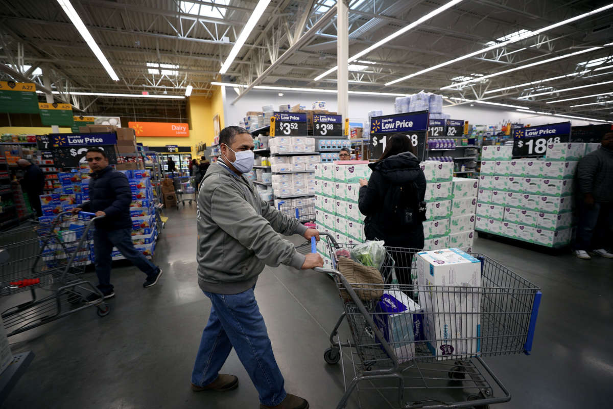 A person wears a face mask as a precaution while shopping in New York, March 2, 2020. New York confirmed its first case of the novel coronavirus late Sunday.