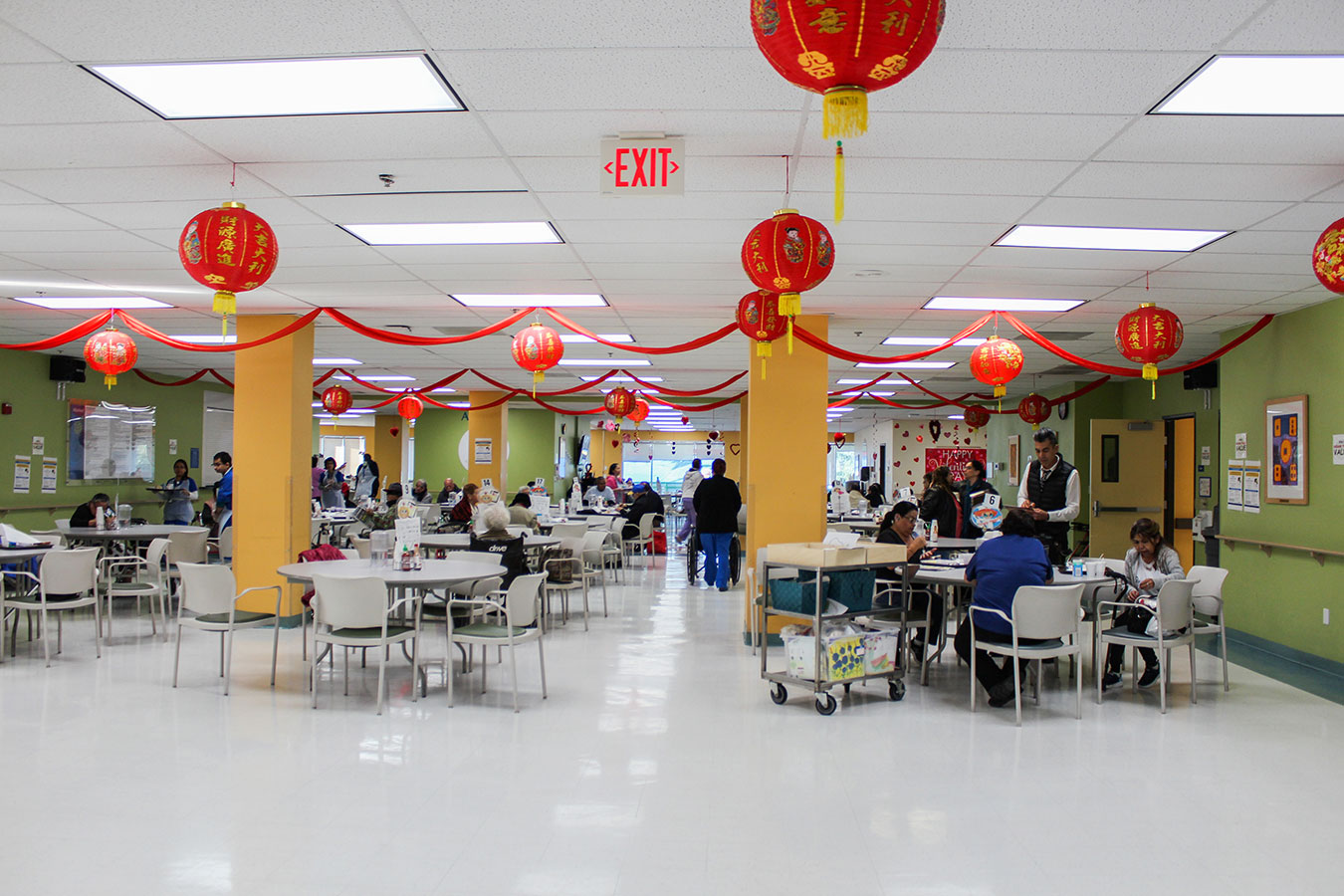 The multipurpose room is the hub of activity at the AltaMed PACE center in L.A.’s Chinatown.