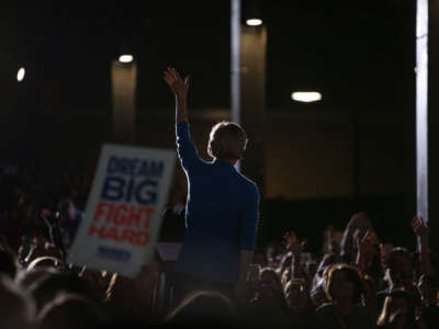 Sen. Elizabeth Warren waves during a rally on March 3, 2020, in Detroit, Michigan, at the Detroit Kitchen Connect on Super Tuesday.