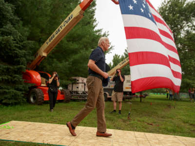 Former Vice President Joe Biden walks to a stage to give a speech during the Polk County Steak Fry at the Water Works Park in Des Moines, Iowa, September 21, 2019.