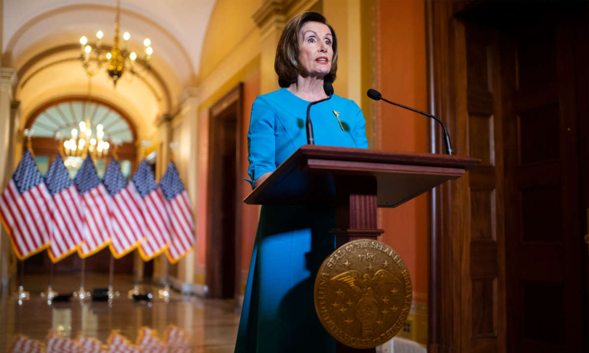 Speaker of the House Nancy Pelosi makes a statement about the Families First Coronavirus Response Act aid package in the Capitol on March 13, 2020.