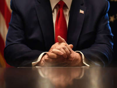 President Trump's hands are seen as he speaks to the press after a meeting with nursing industry representatives on the response to COVID-19, at the White House in Washington, D.C., March 18, 2020.