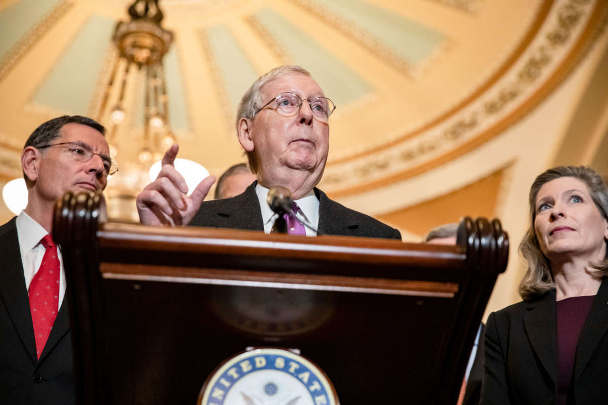 Senate Majority Leader Mitch McConnell speaks to reporters alongside Sens. John Barrasso and Joni Ernst, following the Senate Republican policy luncheon on March 10, 2020, in Washington, D.C.