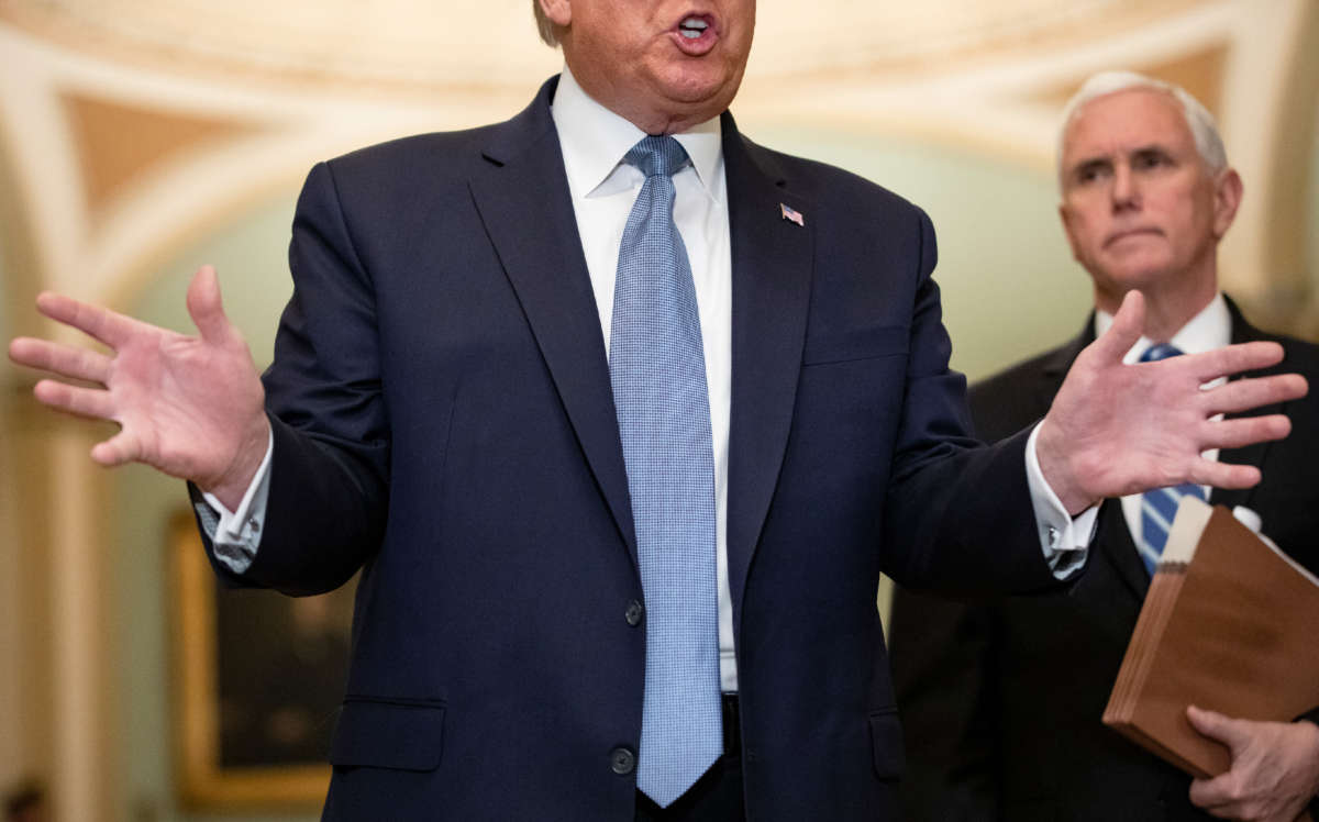 President Trump talks to reporters at the U.S. Capitol with Vice President Mike Pence on March 10, 2020, in Washington, D.C.