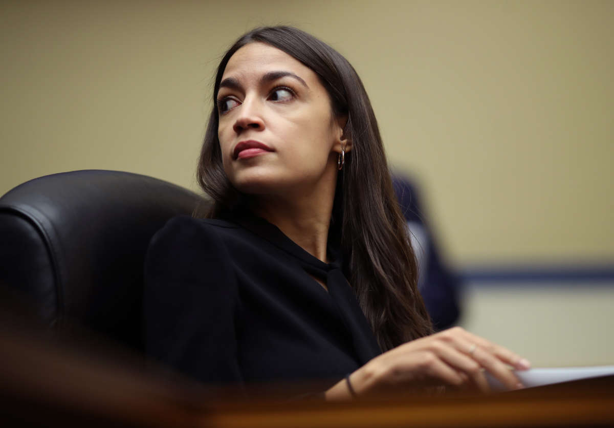 Rep. Alexandria Ocasio-Cortez listens to testimony before the House Oversight and Reform Committee on July 18, 2019, in Washington, D.C.