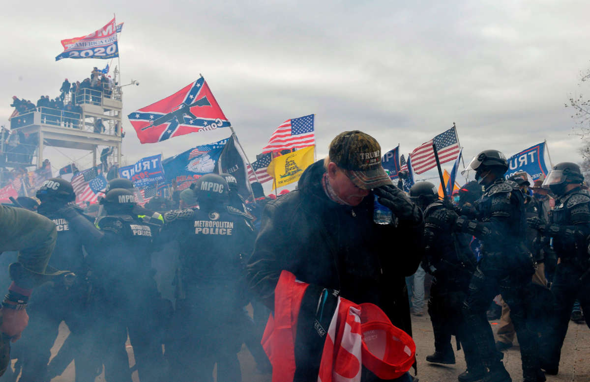 Trump supporters clash with police and security forces as people try to storm the U.S. Capitol Building in Washington, D.C., on January 6, 2021.