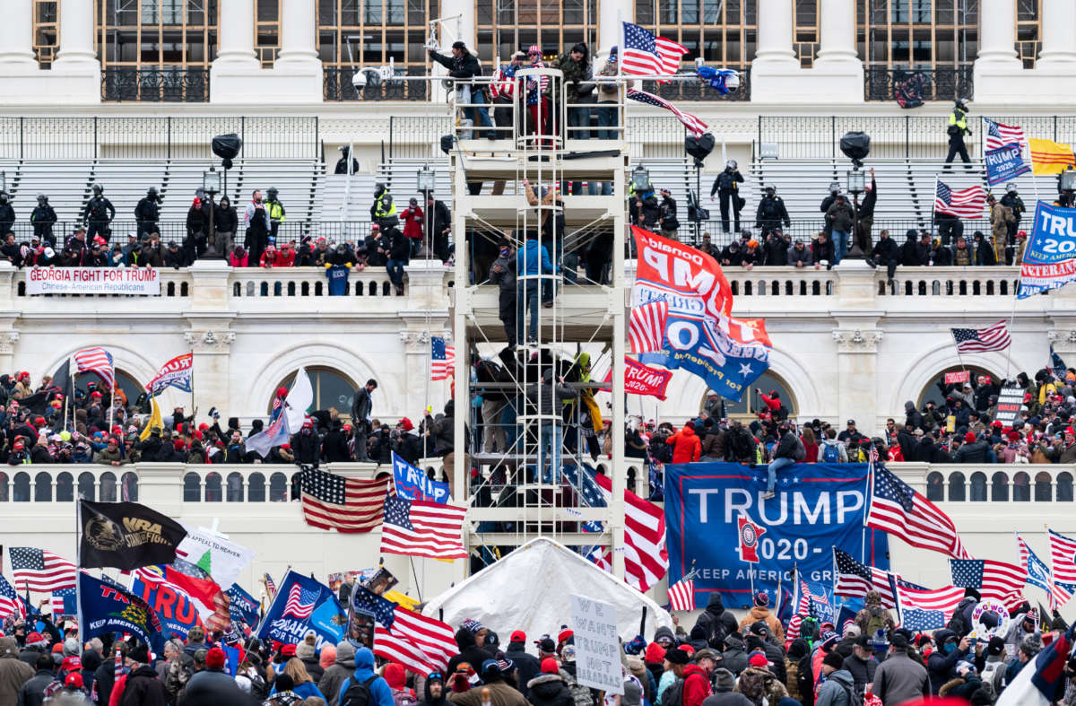 Trump supporters occupy the West Front of the Capitol and the inauguration stands on January 6, 2021.