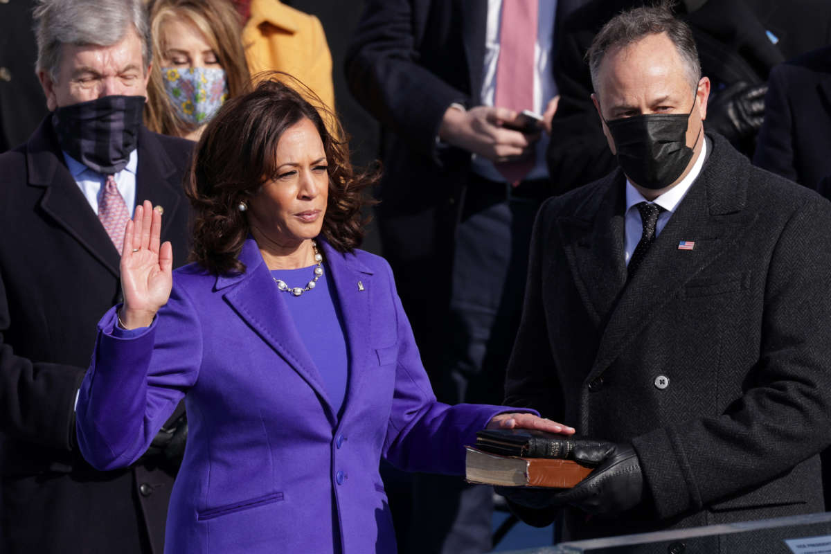 Kamala Harris is sworn as Vice President by Supreme Court Associate Justice Sonia Sotomayor as her husband Doug Emhoff looks on at the inauguration of President-elect Joe Biden on the West Front of the U.S. Capitol on January 20, 2021, in Washington, D.C.