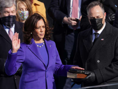 Kamala Harris is sworn as Vice President by Supreme Court Associate Justice Sonia Sotomayor as her husband Doug Emhoff looks on at the inauguration of President-elect Joe Biden on the West Front of the U.S. Capitol on January 20, 2021, in Washington, D.C.