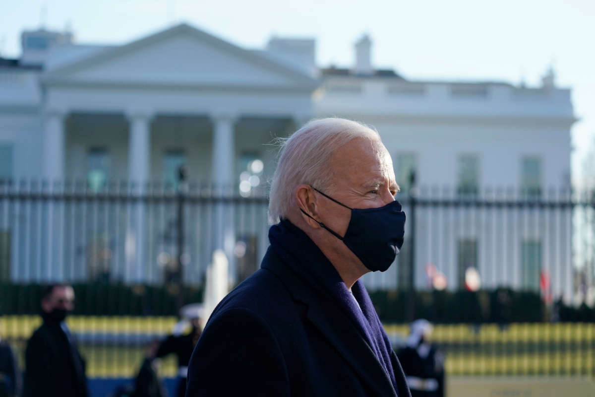 President Joe Biden walks the abbreviated parade route in front of the White House after his inauguration on January 20, 2021, in Washington, D.C.