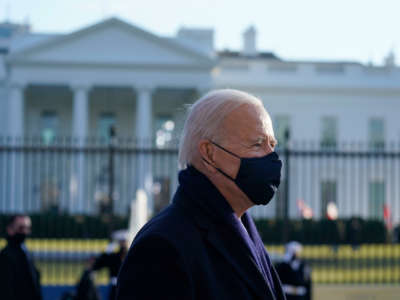 President Joe Biden walks the abbreviated parade route in front of the White House after his inauguration on January 20, 2021, in Washington, D.C.