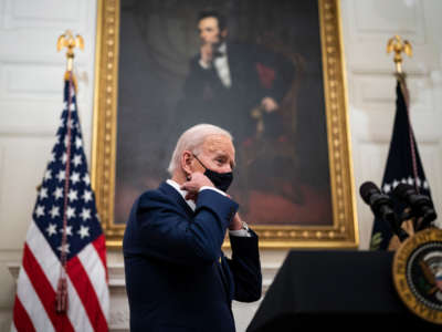 President Joe Biden arrives to speak about the economy before signing executive orders in the State Dining Room at the White House on January 22, 2021, in Washington, D.C.