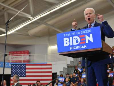 Democratic presidential candidate former Vice President Joe Biden gestures as he speaks during a campaign rally at Renaissance High School in Detroit, Michigan, on March 9, 2020.