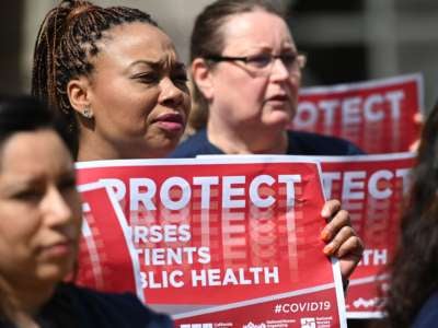 Nurses protest the Center for Disease Control's (CDC) weak response to the COVID-19 pandemic on March 11, 2020, outside the UCLA Medical Center in Los Angeles, California.