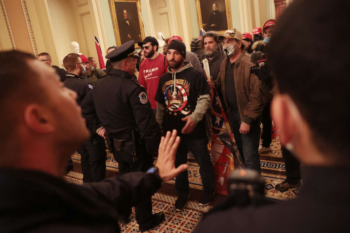 Protesters interact with Capitol Police inside the U.S. Capitol Building on January 6, 2021, in Washington, D.C.