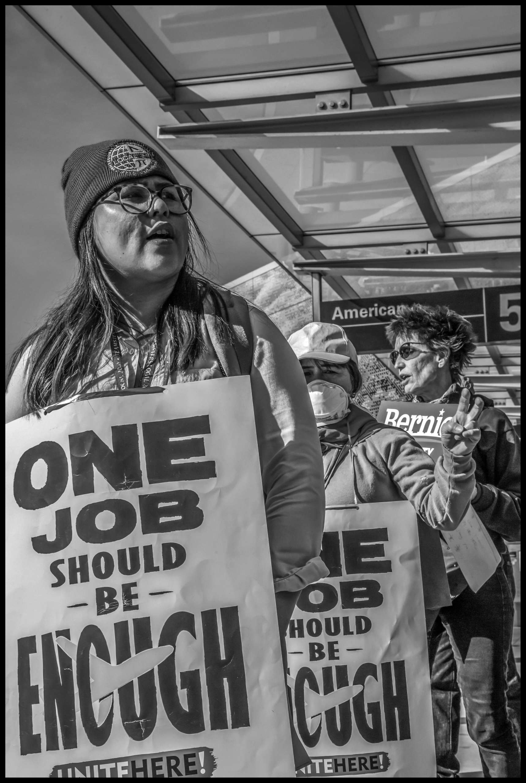 Supporters of Bernie Sanders picket with airline food workers. Unitehere Local 2 has endorsed Sanders.