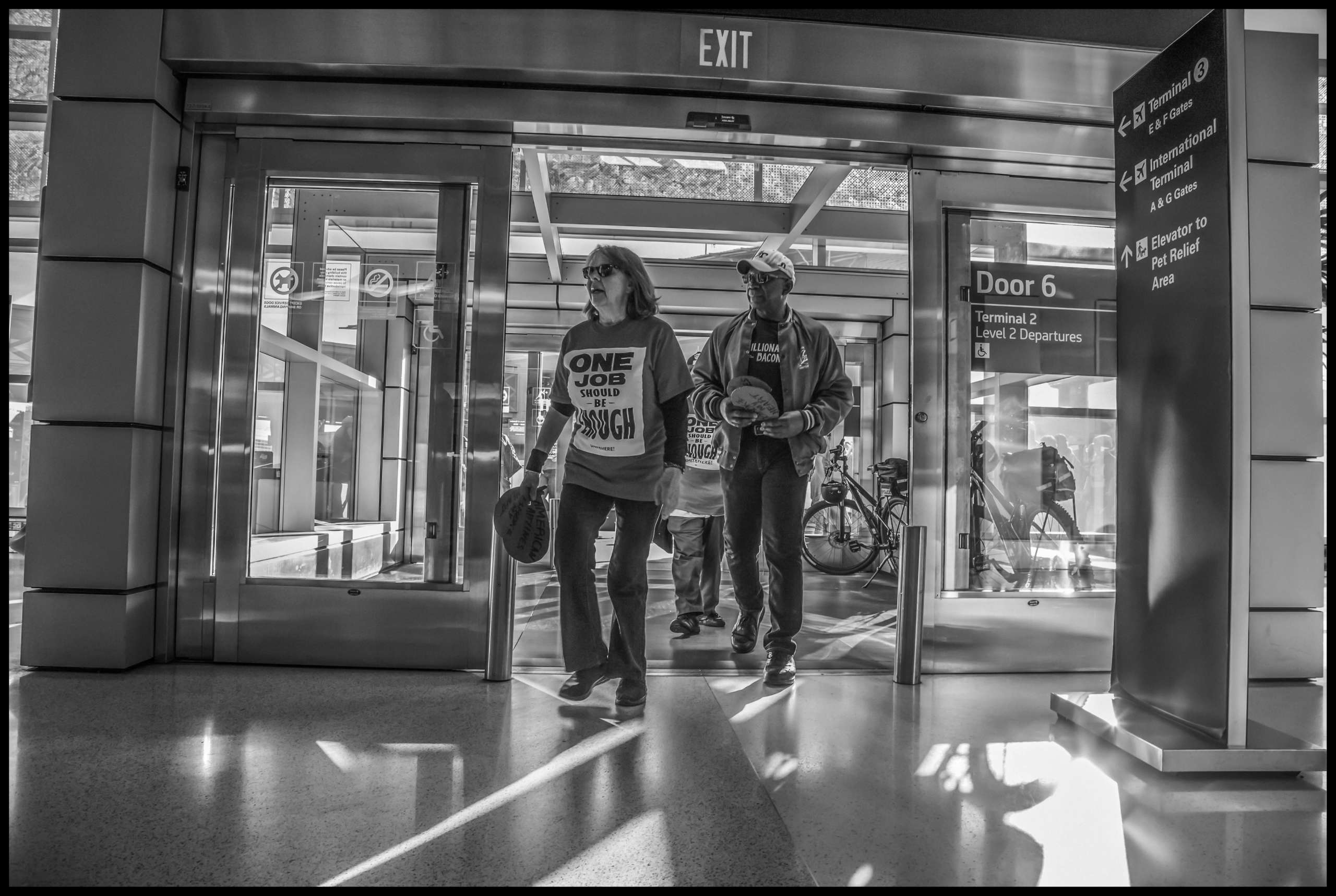 Workers enter the terminal to begin their civil disobedience.