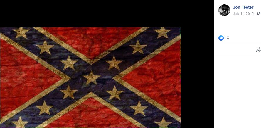 Special Investigative Service employee Jon Teeter publicly posts a confederate flag cover photo to his Facebook account on July 11, 2015.