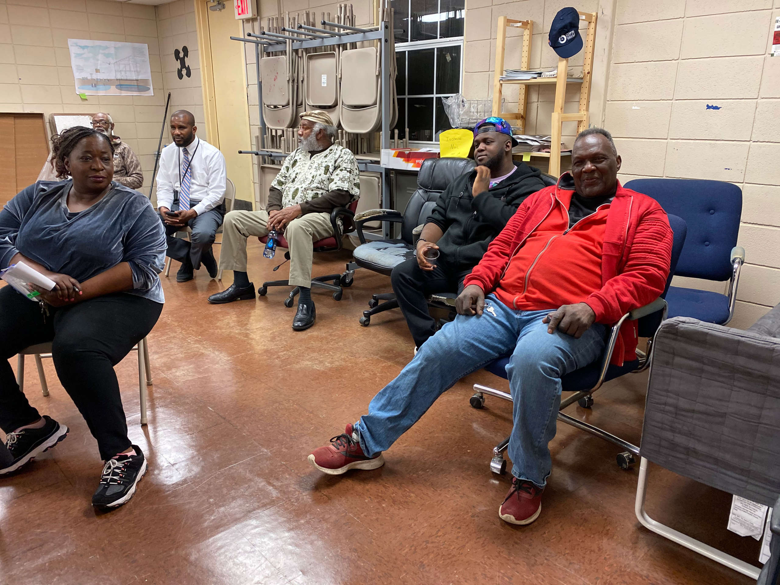Several members of the Poindexter Park Neighborhood Association and two of the tenants of the Ida B. Wells Plaza consider possibilities for revitalization of the plaza at the Emergency Meeting held on February 27, 2020, at the Kuwasi Balagoon Center for Economic Democracy and Sustainable Development.