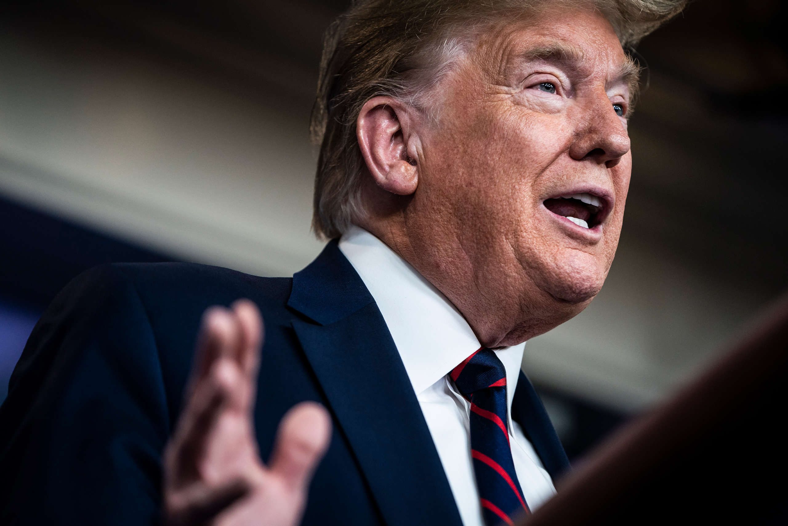 President Trump speaks with members of the coronavirus task force during a briefing in response to the COVID-19 pandemic in the James S. Brady Press Briefing Room at the White House on March 27, 2020, in Washington, D.C.