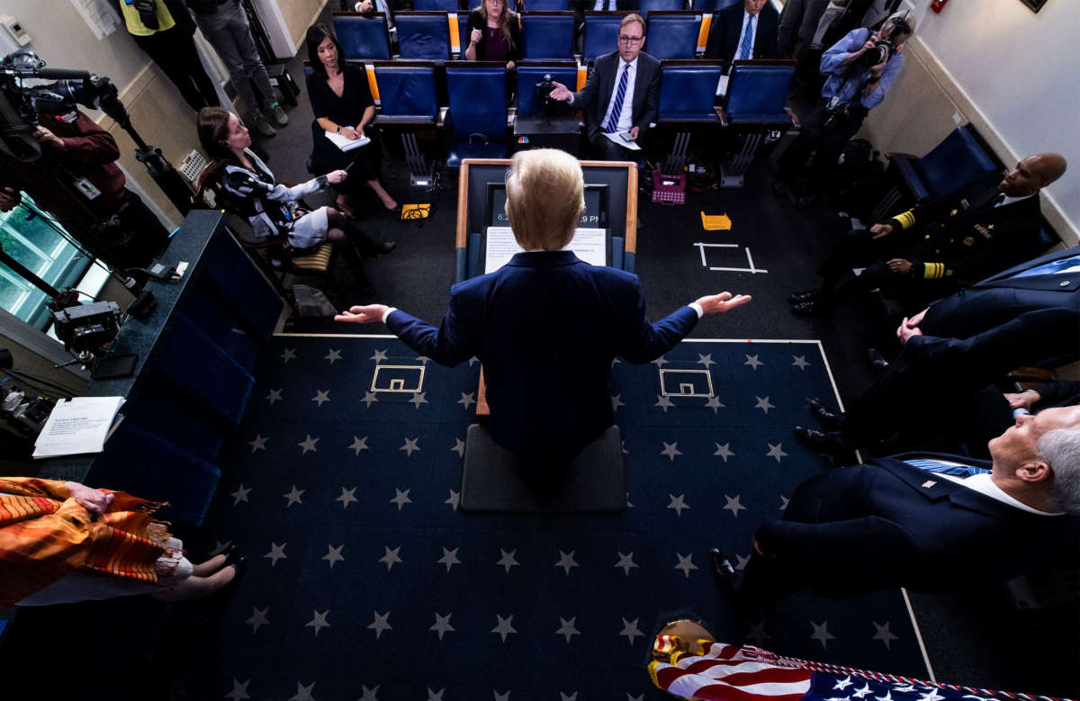 President Trump speaks with members of the coronavirus task force during a briefing in response to the COVID-19 coronavirus pandemic in the James S. Brady Press Briefing Room at the White House on April 3, 2020, in Washington, D.C.