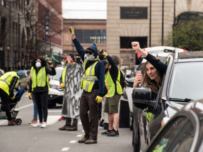 Protesters in Philadelphia demonstrate for the release of people from prisons and jails as the COVID-19 pandemic continues, March 30, 2020.