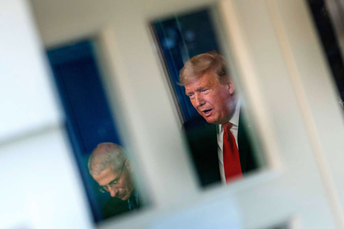 President Trump, flanked by Director of the National Institute of Allergy and Infectious Diseases Anthony Fauci, speaks during the daily briefing on the novel coronavirus, COVID-19, in the Brady Briefing Room at the White House on March 26, 2020, in Washington, D.C.