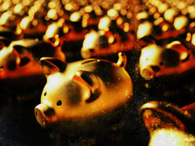 Rows of golden piggy banks