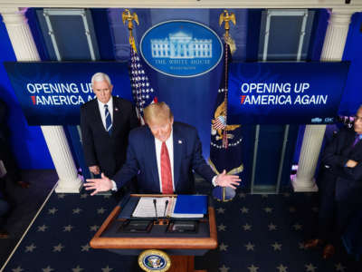 President Trump, flanked by Vice President Pence and Director of the National Institute of Allergy and Infectious Diseases Anthony Fauci, speaks during the daily briefing on the novel coronavirus in the Brady Briefing Room of the White House on April 16, 2020, in Washington, D.C.