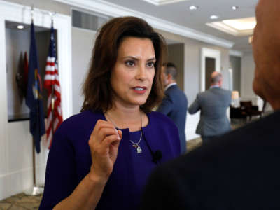 Gretchen Whitmer, then-Michigan Democratic gubernatorial nominee, speaks with a reporter after a Democrat Unity Rally at the Westin Book Cadillac Hotel August 8, 2018, in Detroit, Michigan.