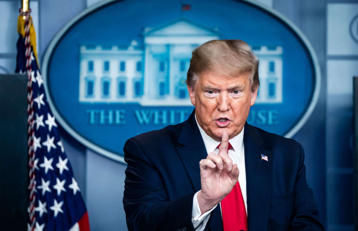 President Trump speaks with members of the coronavirus task force during a briefing in response to the COVID-19 pandemic in the James S. Brady Press Briefing Room at the White House on April 13, 2020, in Washington, D.C.